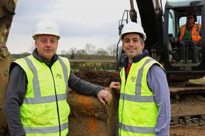 Robert Loudoun left and Paul LeGrice of Abel Homes dig the first sod at the site of 40 new homes in Bawdeswell sm