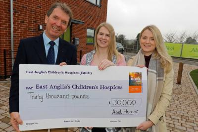 Sophie Mayes right from The Nook Appeal receives a cheque for 30000 from Tony Abel and Kim Macey of Abel Homes sm