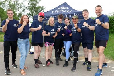 The Vision Norfolk Broads Walk Challenge team getting ready to step out to raise money for the charity sm