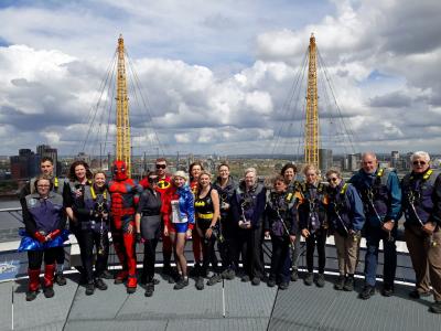 The visually impaired climbers and superheroes from Norfolk on top of the O2 in London