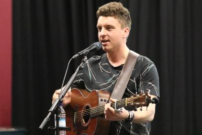 Tom Ryder performing at The Atrium at NWHS