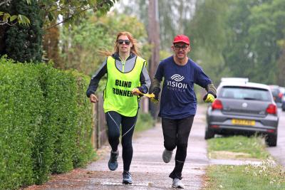 Visually impaired runner Rachael Andrews training for the Sandringham 5K with guide Rob Collins sm