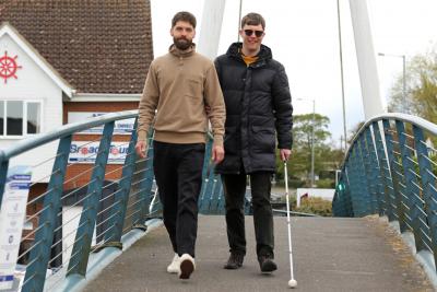 Volunteer Matt Lawley left and blind fundraiser Ed Bates get in training for the Broads Walk Challenge sm