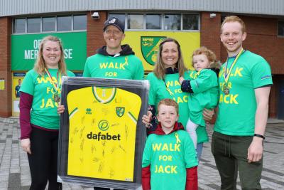 Walk For Jack organisers Elli Cooper left and Mark Bellamy right with Jack Harper and his family sm